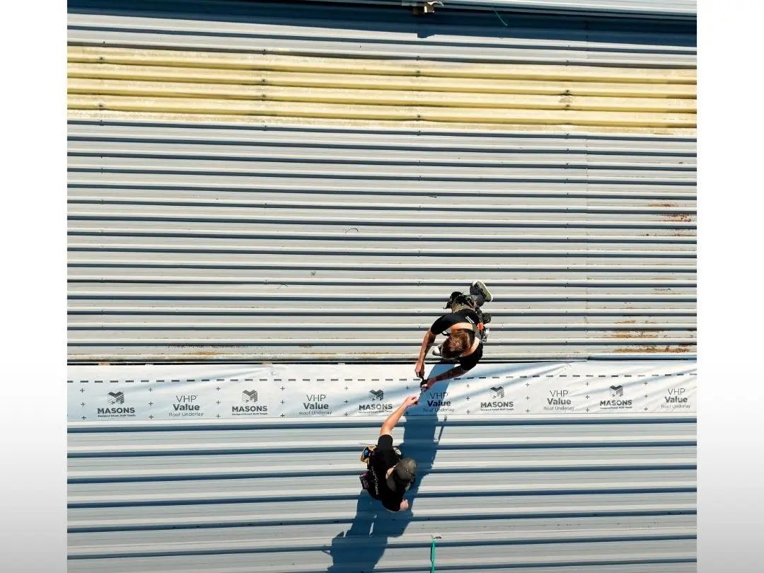 Two of the Exo Roofing crew on a job in Auckland